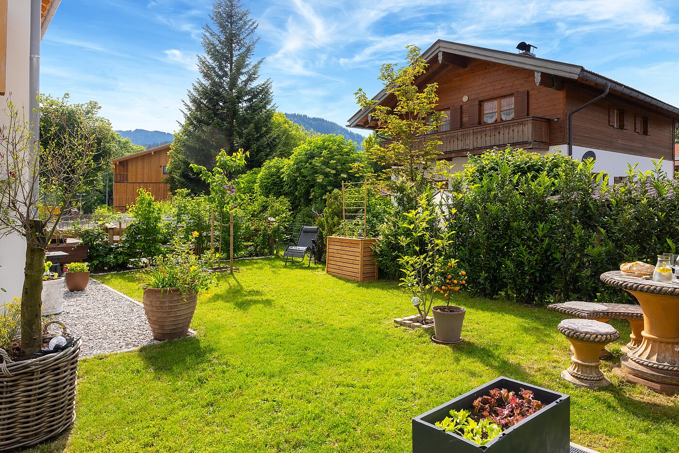 Appartement au rez-de-chaussée avec 2 pièces | Bad Wiessee | 700942 | Großzügiger Garten