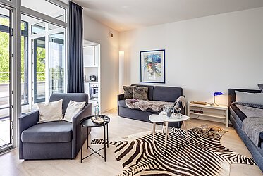 Bogenhausen : Appartement chic avec jardin d'hiver et balcon