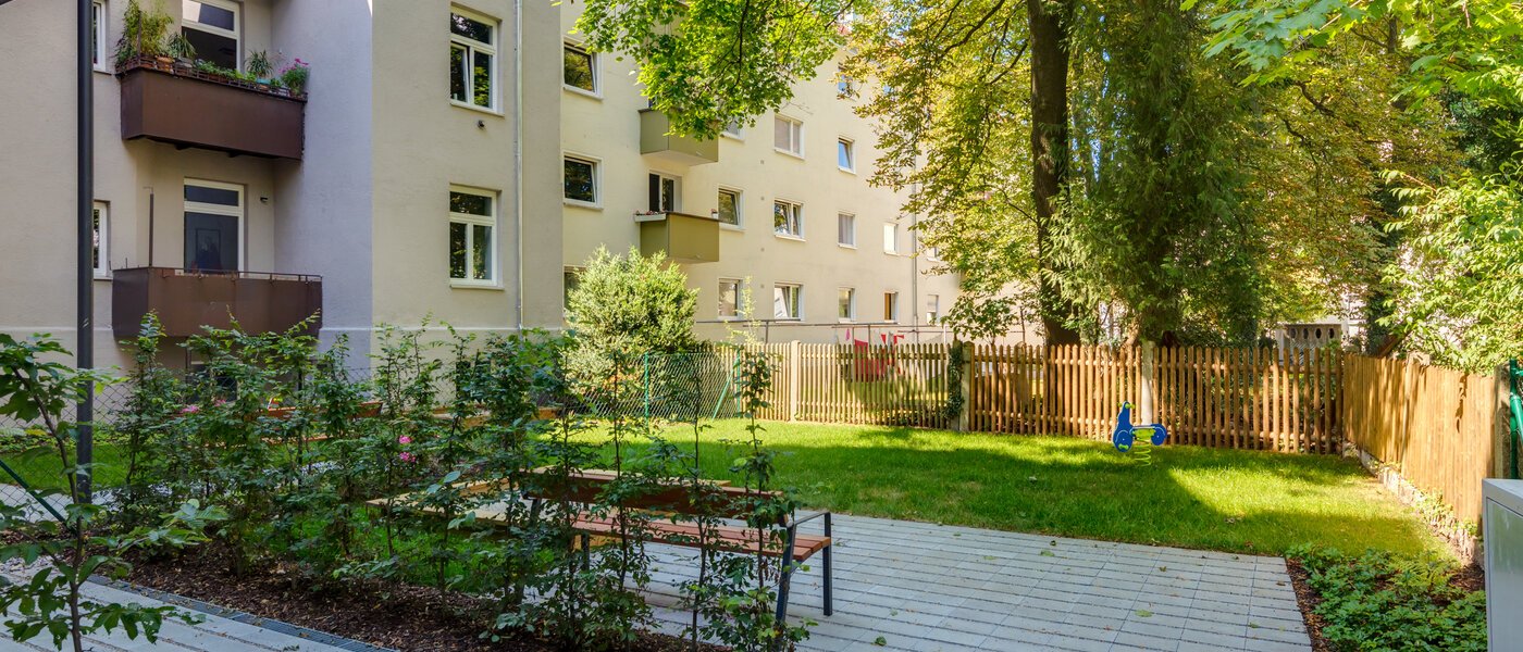 appartement style maisonnette München Pasing 02 jardin commun 11136