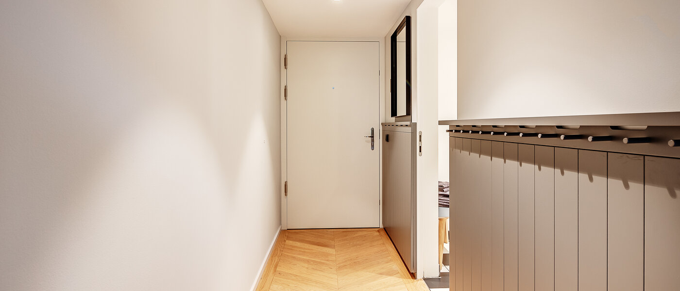 appartement style maisonnette avec mezzanine München Herzogpark 01 entrée/couloir 12618