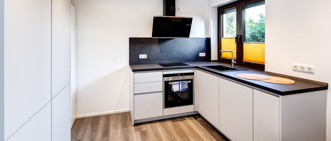 maison mitoyenne placée au milieu de la rangée Germering 01 cuisine 14170