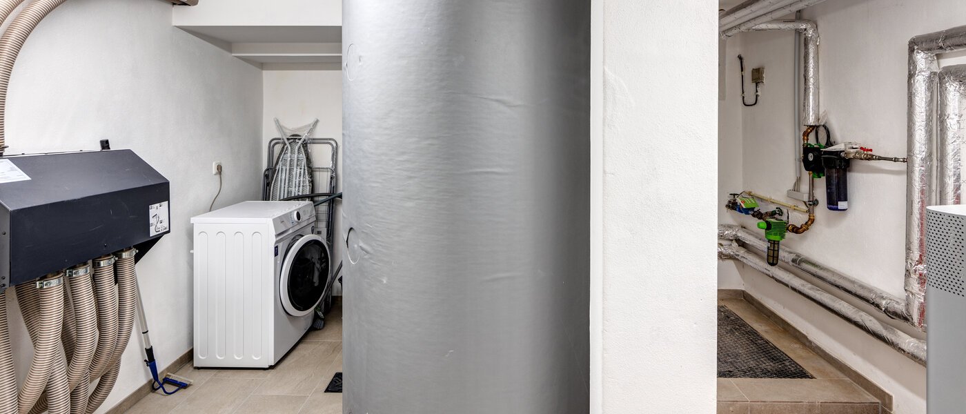 maison mitoyenne placée au milieu de la rangée Germering 01 buanderie 14170