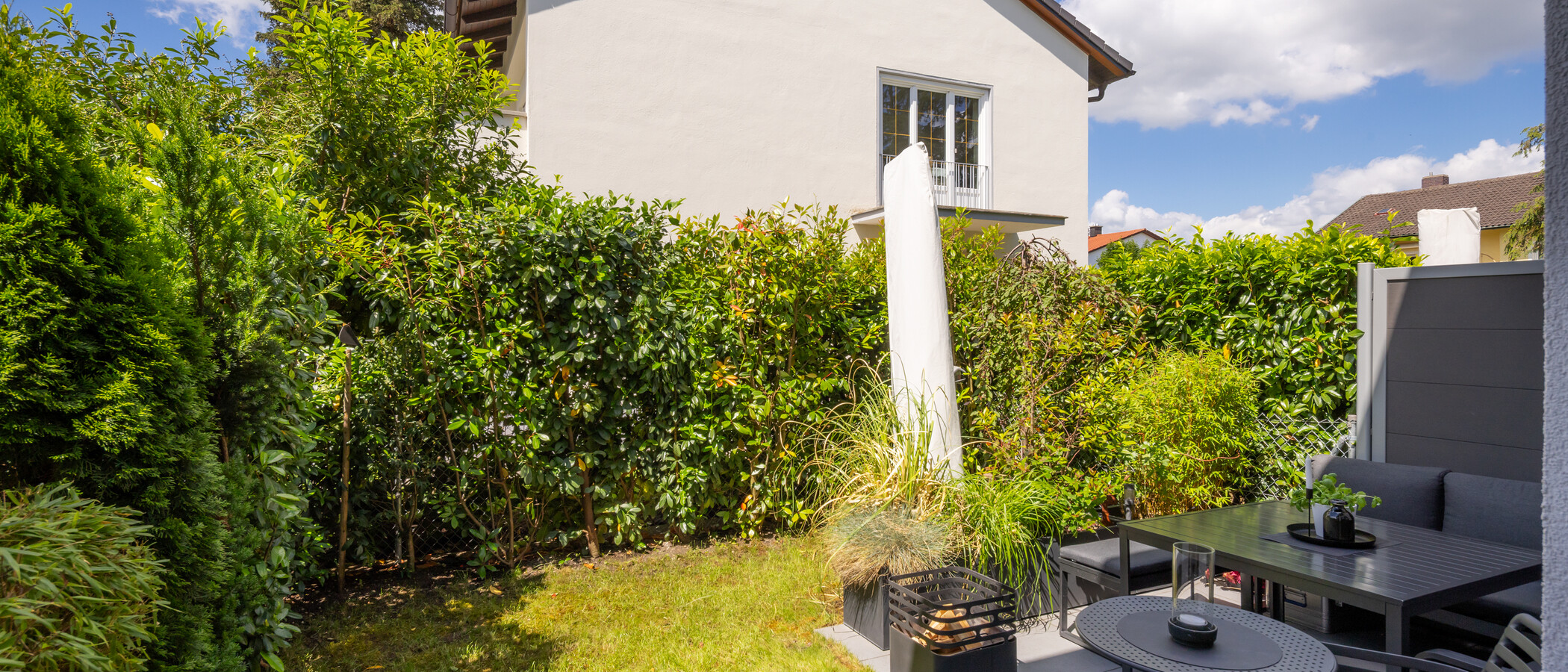maison mitoyenne placée au milieu de la rangée München Untermenzing 02 jardin 14892