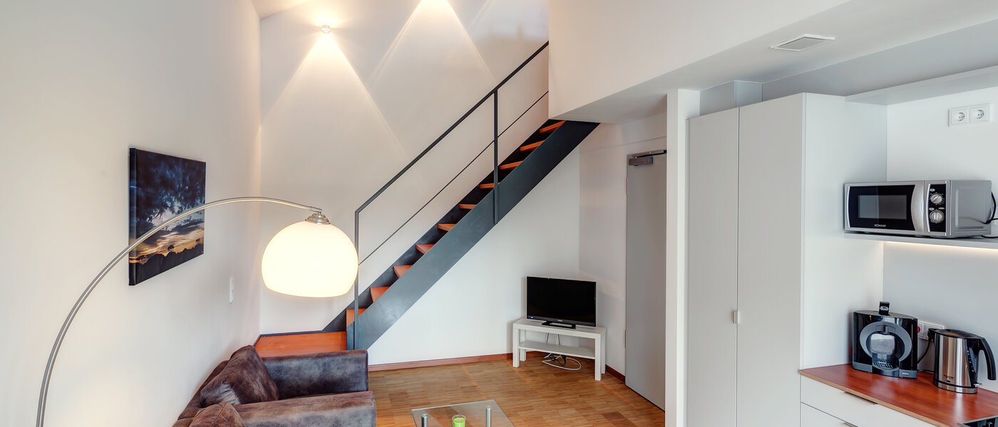 appartement style maisonnette avec mezzanine Unterschleißheim Lohhof 01 salon 9676