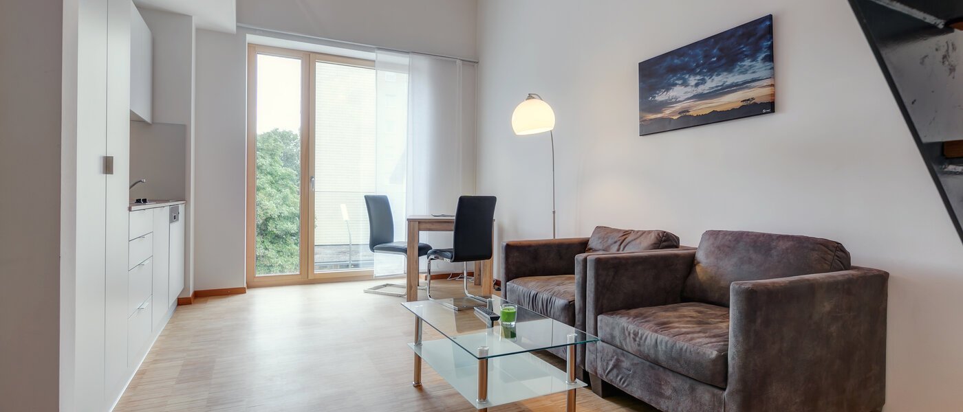 appartement style maisonnette avec mezzanine Unterschleißheim Lohhof 03 salon 9676