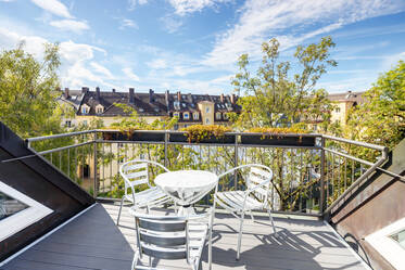 Appartement mansardé avec deux terrasses sur le toit