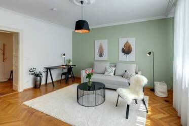 Location d&#039;un appartement de jardin meublé de façon moderne