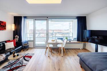 Rénovation soignée avec vue sur les toits de la ville