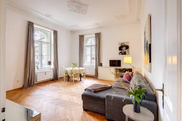 Appartement historique à louer : hauts plafonds, stucs