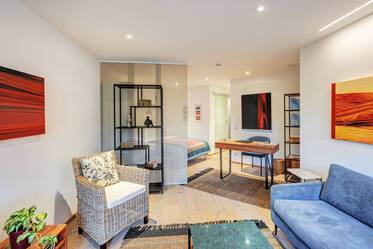 Appartement de 1,5 pièce avec jardin et agencement unique