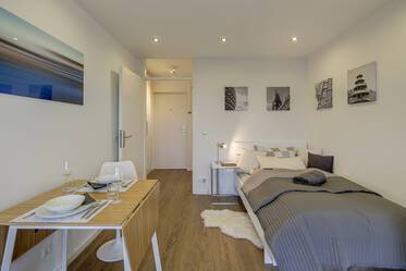 Studio lumineux et moderne avec balcon