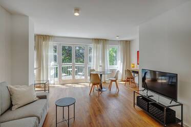 Appartement meublé de façon moderne avec une nouvelle salle de bain et une nouvelle cuisine
