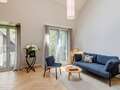 appartement style maisonnette avec mezzanine München Herzogpark 02 pièce à vivre 12527