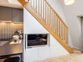 appartement style maisonnette avec mezzanine München Herzogpark 05 pièce à vivre 12527