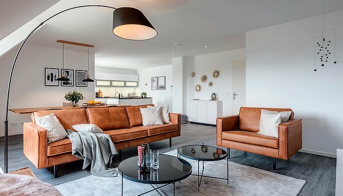 [Translate to french:] Eingerichtetes Wohnzimmer